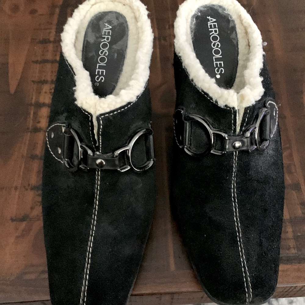 Women’s Black Aerosoles heeled mules.